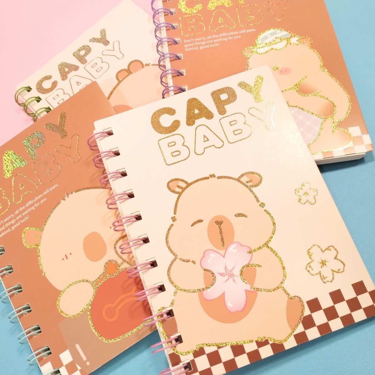 Libreta A6 Capybara c/dorado y espiral - 80 hojas rayadas