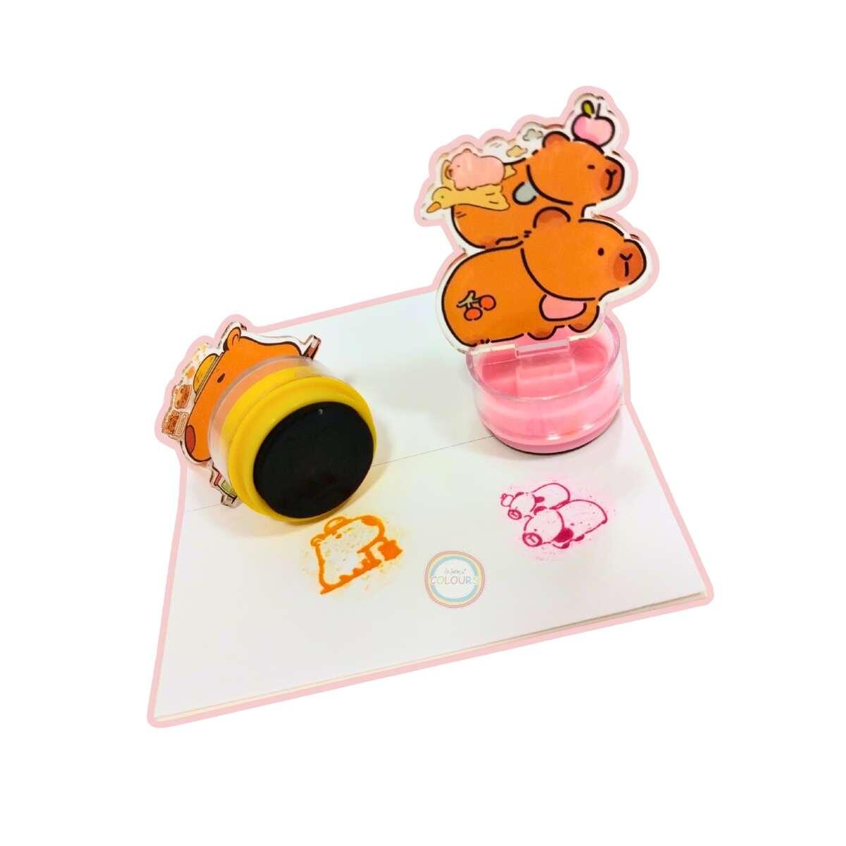 Sello Capybara x 2 en caja pvc c/mini block