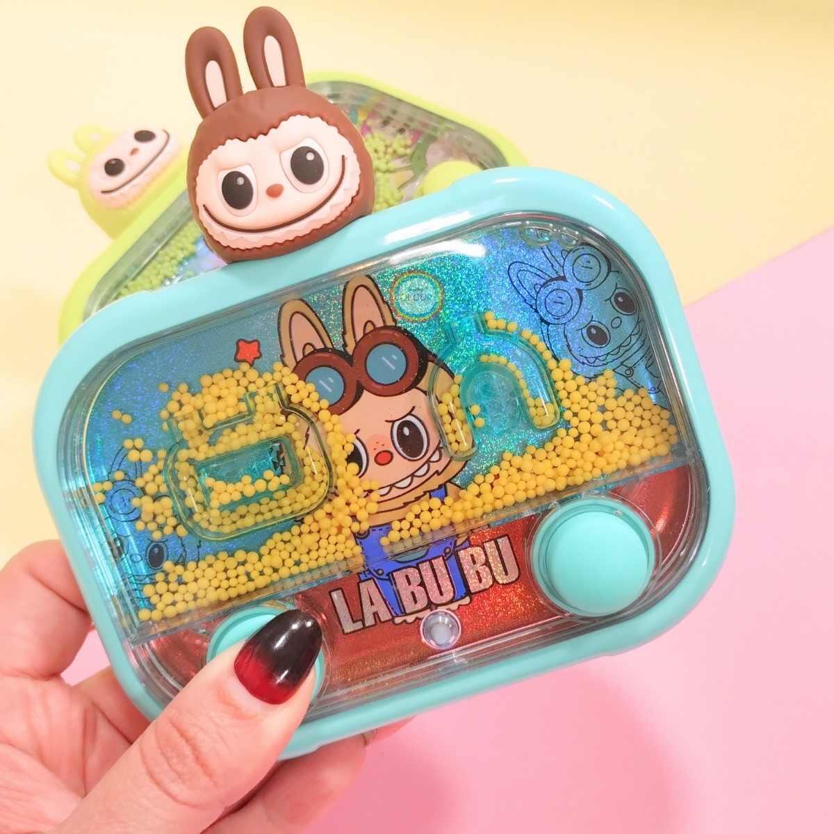 Juego de agua Labubu c/mini aplique 2 botones y luz